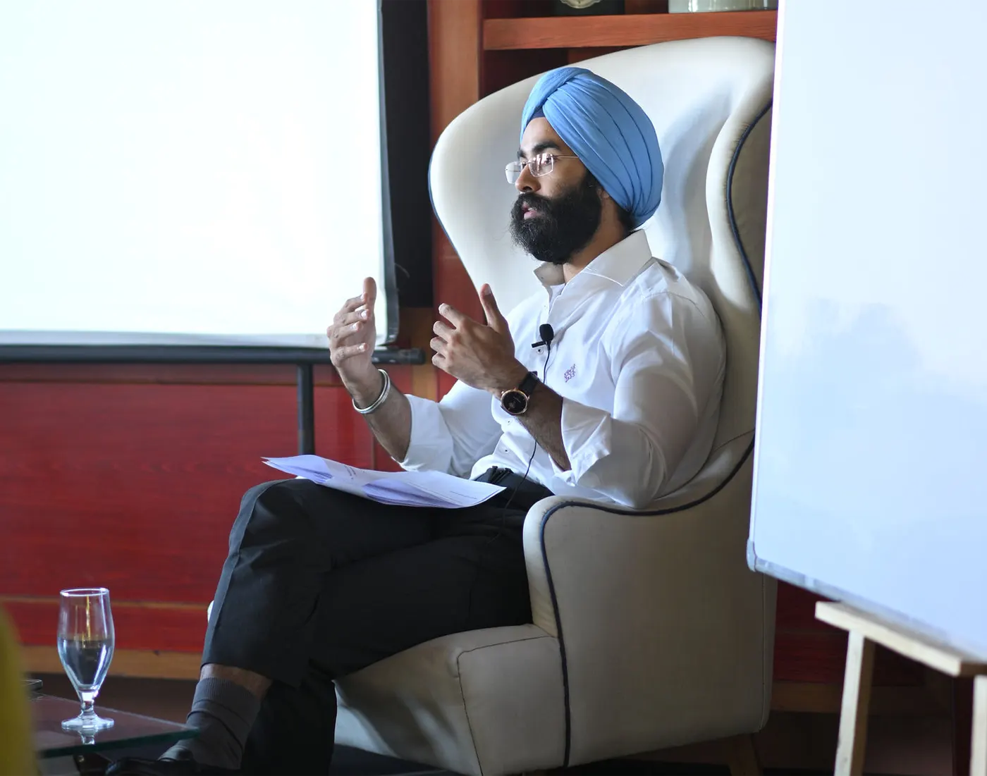 Karan teaching a small group